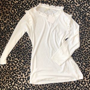 Long sleeved ruffle blouse